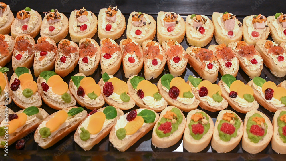 Canapes served in restaurant. Decorative food. Delicious snacks. Hors d'oeuvre.