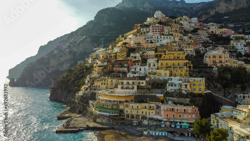 Positano Top view of sea, Positano town and mountains. Turquoise colors, Green, blue sky and Beautiful view at Sunset