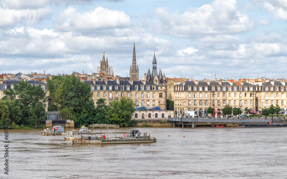 Bordeaux, France. Panoramic view of the city with Saint Michel cathedral over the river Garonne.