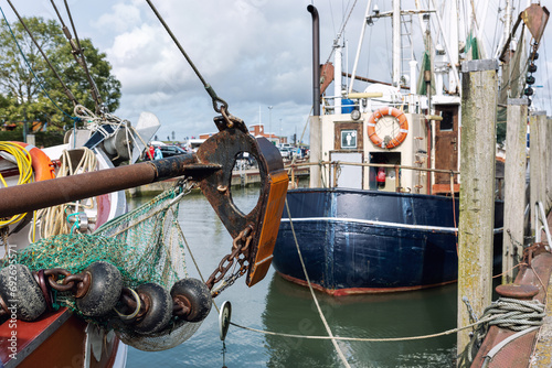 Bilde på lerret Traditional old german fishing cutter boats moored Neuharlingersiel harbor Wadden sea East Frisia Northern Germany