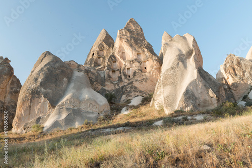 eroded volcanic rock formations with pigeon houses, Cappadocia, Turkey photo