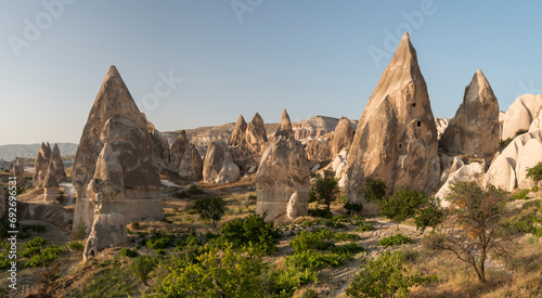 eroded volcanic rock formations, the fairy chimneys in the evening lights, Cappadocia, Turkey