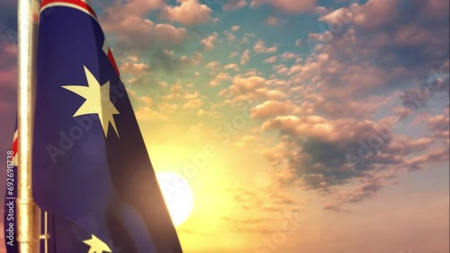 Australia waving flag on beautiful sunset background photo