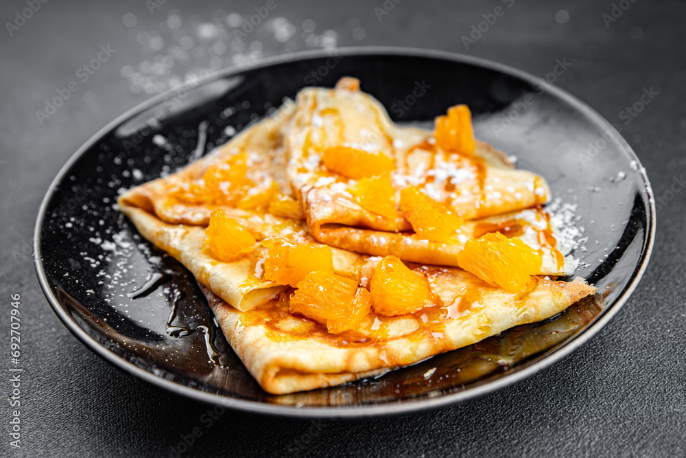 crepe pancake orange and syrup fresh delicious healthy eating cooking appetizer meal food snack on the table copy space crepe pancake orange and syrup fresh delicious healthy eating cooking appetizer meal food snack on the table copy space