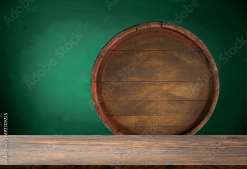 Old wooden barrel on a brown background. High quality photo