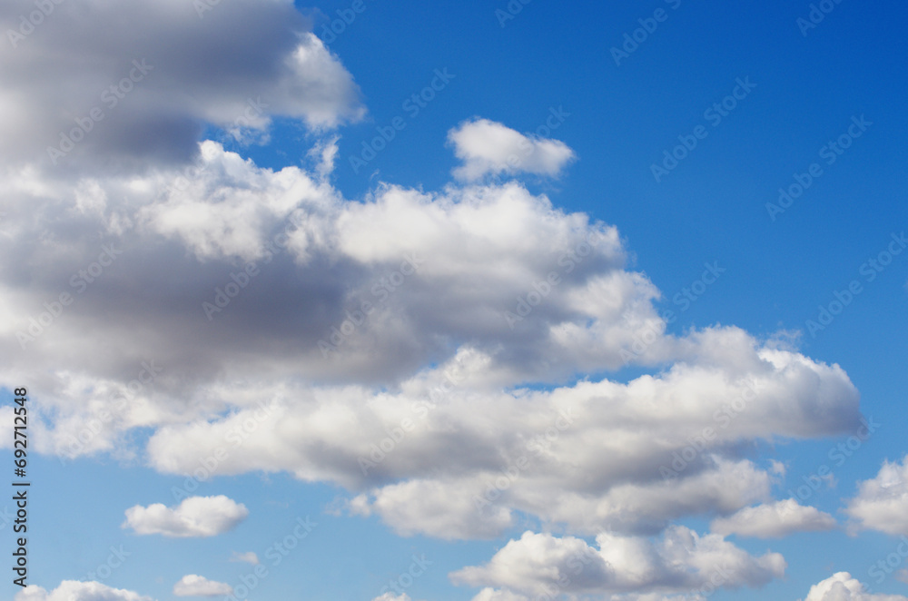 Naklejka premium White clouds in blue sky