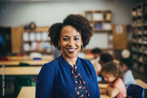 Smiling portrait of young teacher in classroom