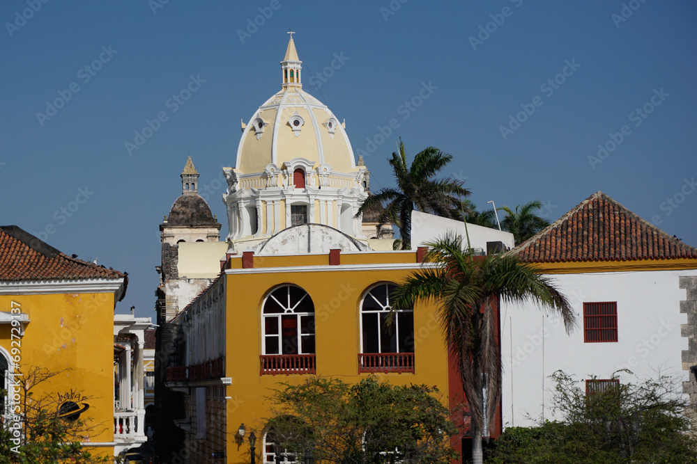 Buildings in Cartagena with the belltower of the Curch of St. Peter Claver, Iglesia de San Pedro Claver in the background, Colombia