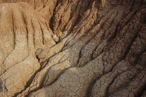 Dired out soil on the red and yellow rock formations in the Tatacoa Desert, Desierto de la Tatacoa, Colombia