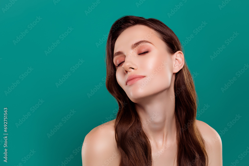 Photo of pretty dreamy lady naked shoulders closed eyes empty space isolated green color background Photo of pretty dreamy lady naked shoulders closed eyes empty space isolated green color background