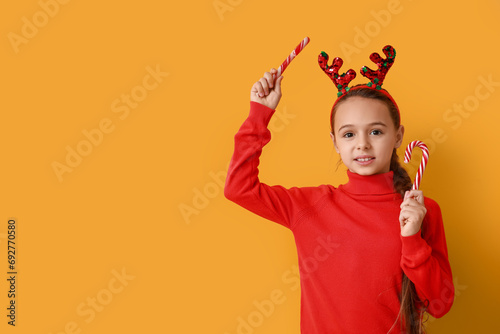 Cute little girl in reindee...