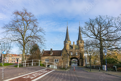 Iconic Delft Gothic city gate "Oostpoort" (Eastern Gate) from the 14th century. Delft, The Netherlands.
