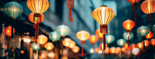 Paper lanterns with colorful lighting on the streets of old Asian town background. photo