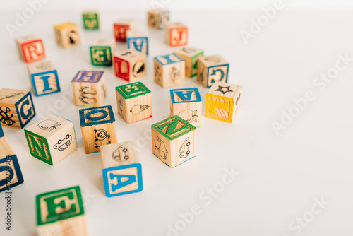 Group of Wooden Alphabet Blocks on Table photo