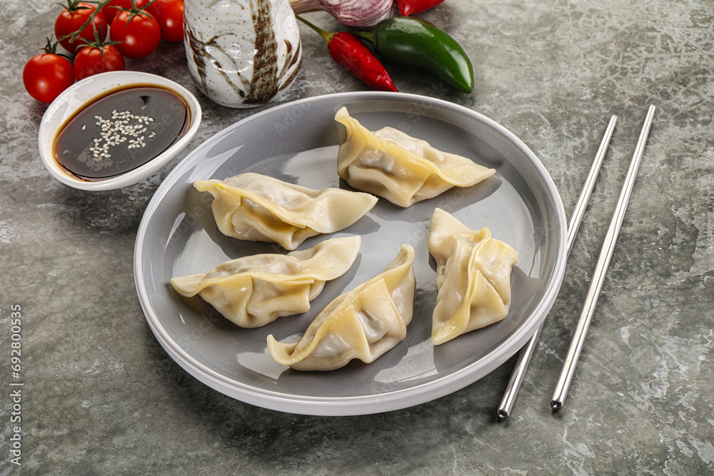 Japanese cuisine - dumplings gyoza with sauce Japanese cuisine - dumplings gyoza with sauce