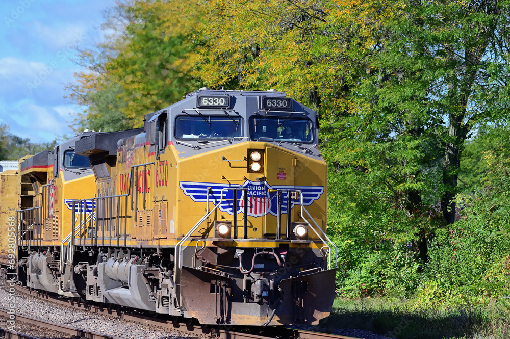 Multiple locomotives lead a Union Pacific Railroad freight train ...