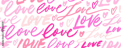 Calligraphy seamless banner design with pink words 'love' and small hearts.