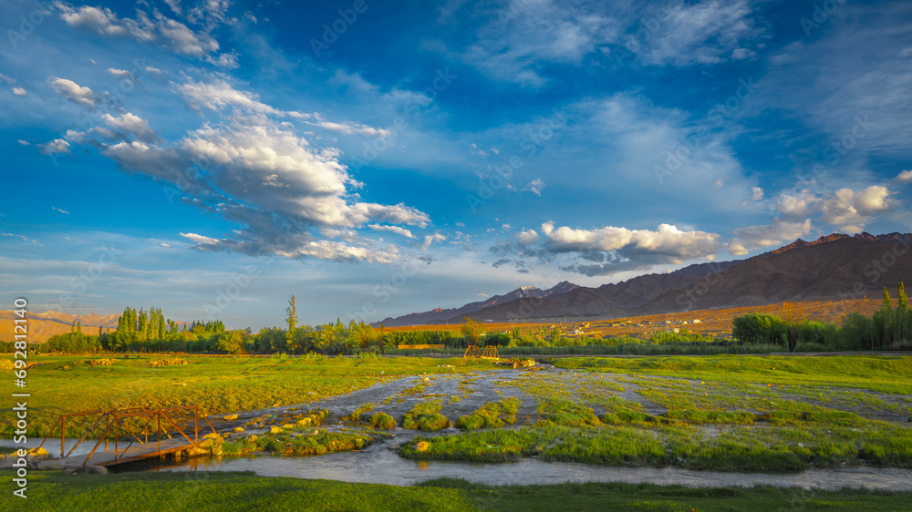 autumn landscape with mountains and clouds