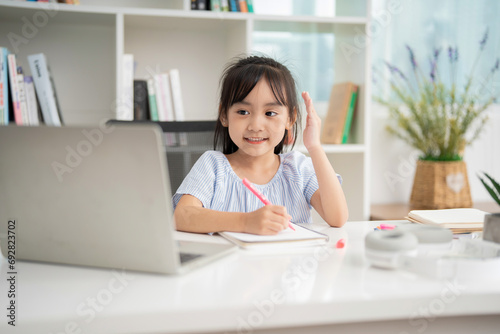Photo of young Asian baby girl studying at home © Timeimage