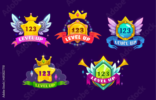 Game interface level up badges and win icons, gold award, winner reward and victory trophy, vector game ui assets. Cartoon rank buttons set of golden medals, stars, crowns, shields and ribbon banners