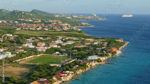 Panoramic aerial parallax around football field in Boca Sami near coast of Curacao photo