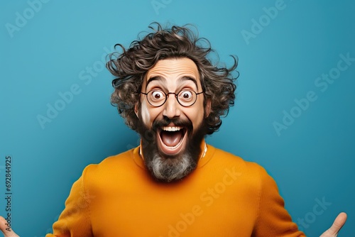 wall color fl wow saying success celebrating laughing happy excited shocked feeling man crazy bearded young amazement amazing celebrate charming fascinating fun happiness shock successful surprise photo