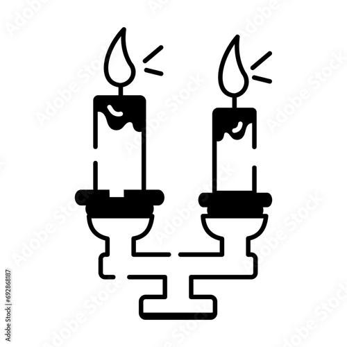 Trendy linear icon depicting a candelabra 