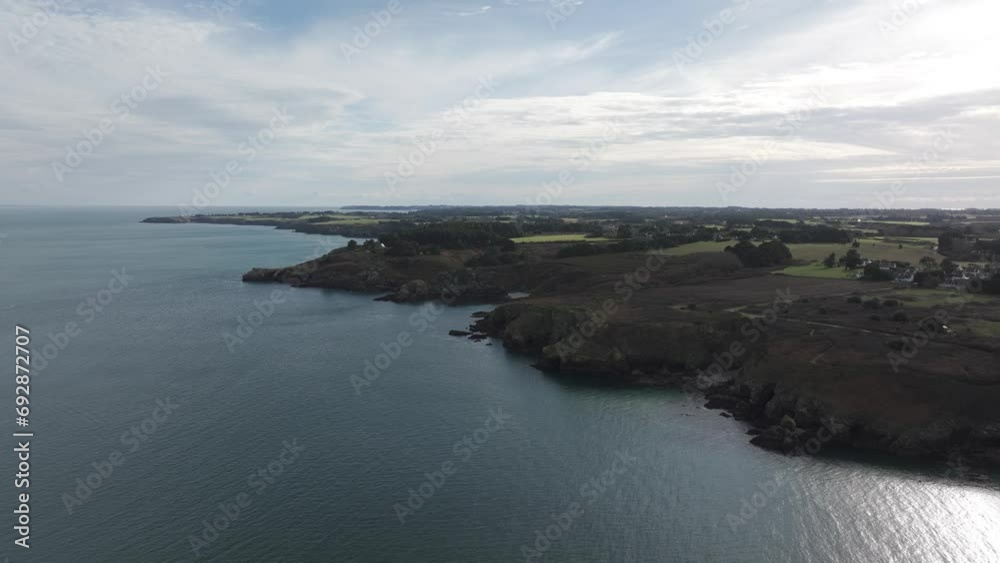 Rough rocky shore near Port Sauzon on the Belle Island coast Brittany France, Aerial flyover shot Rough rocky shore near Port Sauzon on the Belle Island coast Brittany France, Aerial flyover shot