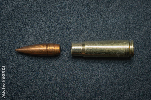 Disassembled 7.62x39mm caliber cartridge. Bullet and cartridge case from a rifle.