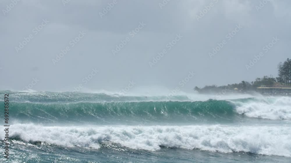Powerful Waves and Surfers in the Ocean During Cyclone Season on Coast of Australia, Slow Motion Powerful Waves and Surfers in the Ocean During Cyclone Season on Coast of Australia, Slow Motion