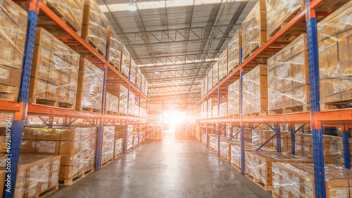 Full of goods stock in warehouse industrial and logistics background. Commercial Storage area. Large products distribution Inventory cargo shelves.