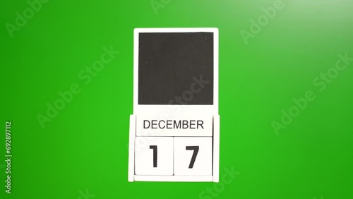 Calendar with the date December 17 on a green background. Illustration for an event of a certain date. photo