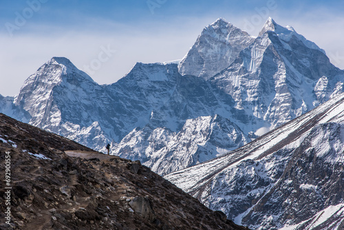 A trekker walking toward Everest base camp in Nepal