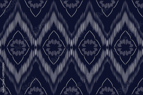 Ikat pattern . Geometric chevron abstract illustration, wallpaper. Tribal ethnic vector texture. Aztec style. Folk embroidery. Indian, Scandinavian, African rug.design for carpet,sarong  