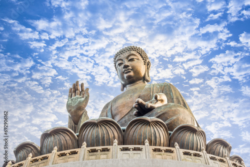 Tian Tan Buddha Statue Po Lin Monastery, Lantau Island, Ngong Ping Village, Hong Kong, scenery on heaven Big buddha, religion sacred landmark of tourists, buddhists tourism. On sky cloudy background. #692906162