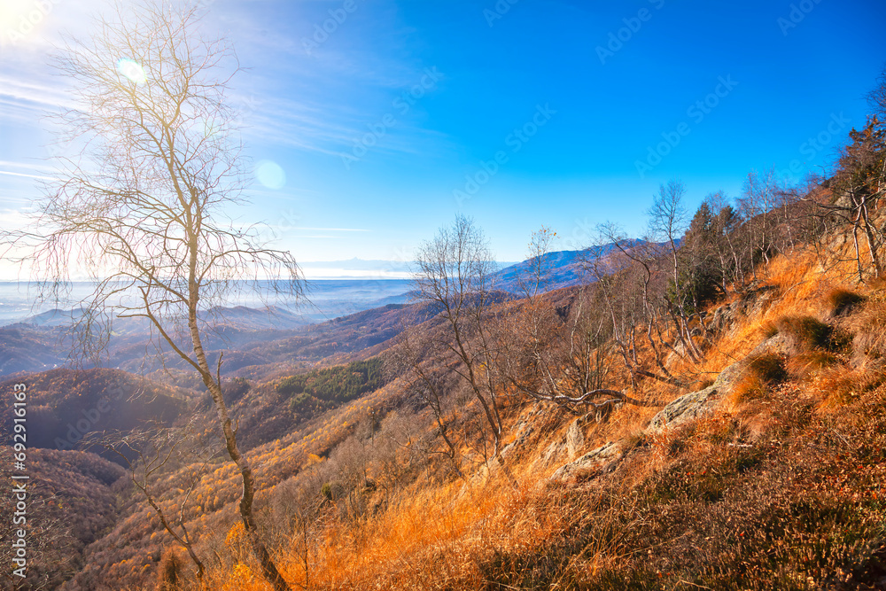 Winter panorama of the mountains surrounding the wilderness area of Valdilana. Is a natural parkland in the Biella Province (Northern Italy, Piedmont Region), and renowned ski area.