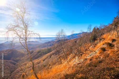 Winter panorama of the mountains surrounding the wilderness area of Valdilana. Is a natural parkland in the Biella Province  Northern Italy  Piedmont Region   and renowned ski area.