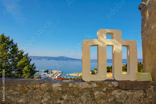 The Glagolitic alphabet letter L in the Stari Grad historic centre of the coastal town of Novi Vinodolski, Primorje-Gorski Kotar County, Croata. It is t