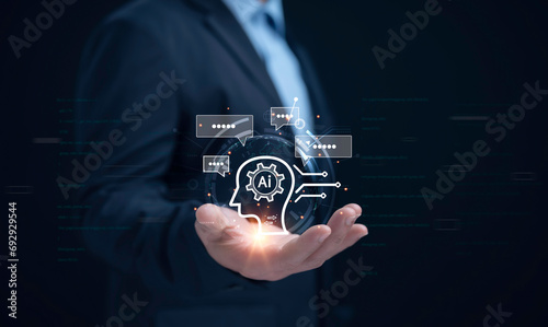 Businessman use of technology smart robot AI , artificial intelligence for generates something, Futuristic technology transformation.Chat with smart AI concept