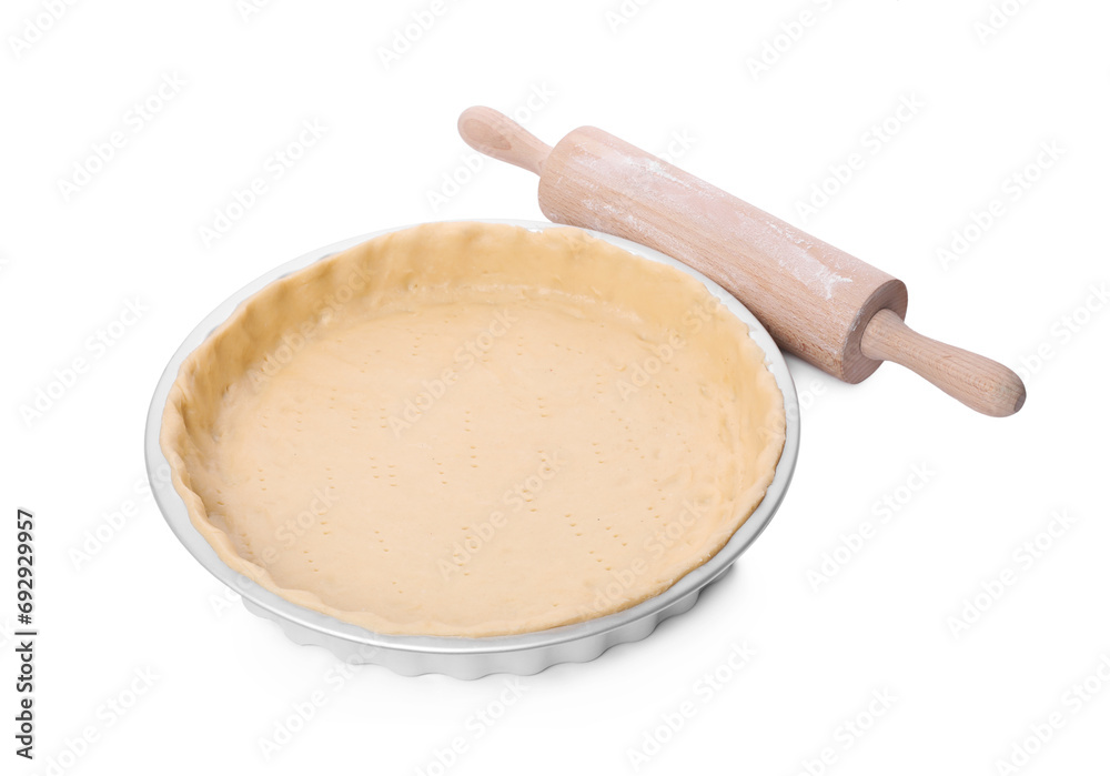 Quiche pan with fresh dough and rolling pin isolated on white Quiche pan with fresh dough and rolling pin isolated on white