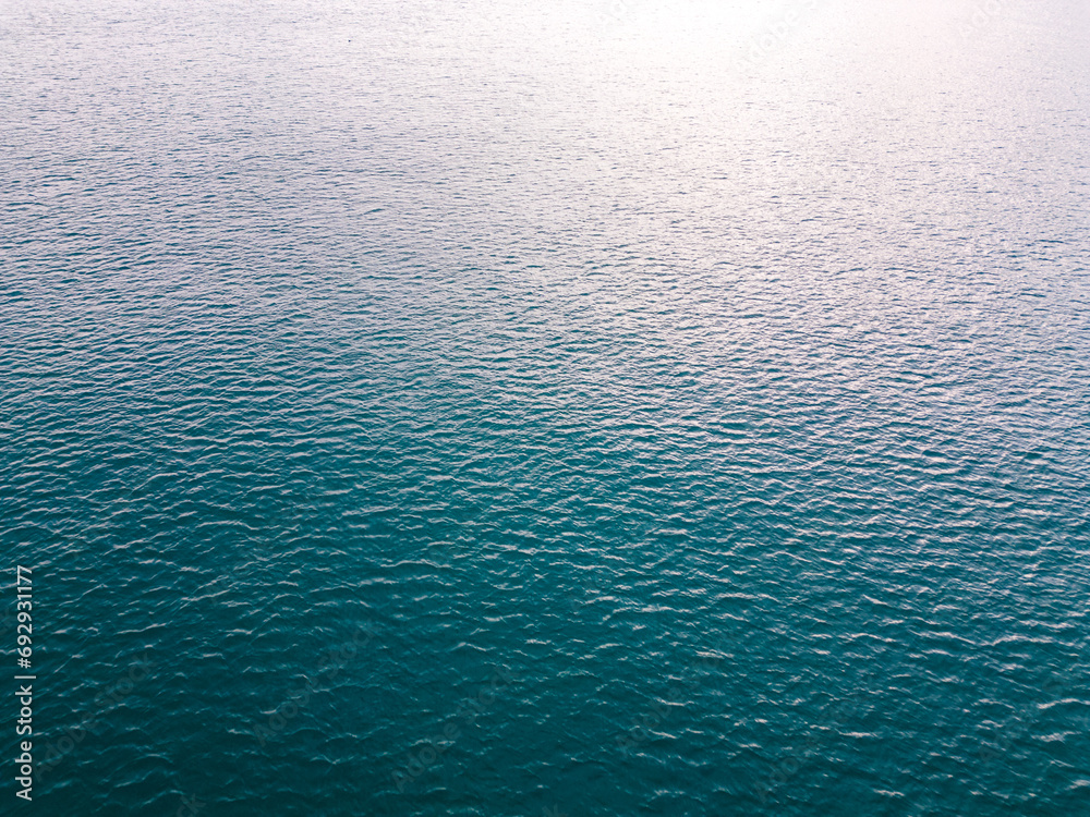 Aerial view of the sea surface pattern reflecting the sky background Aerial view of the sea surface pattern reflecting the sky background