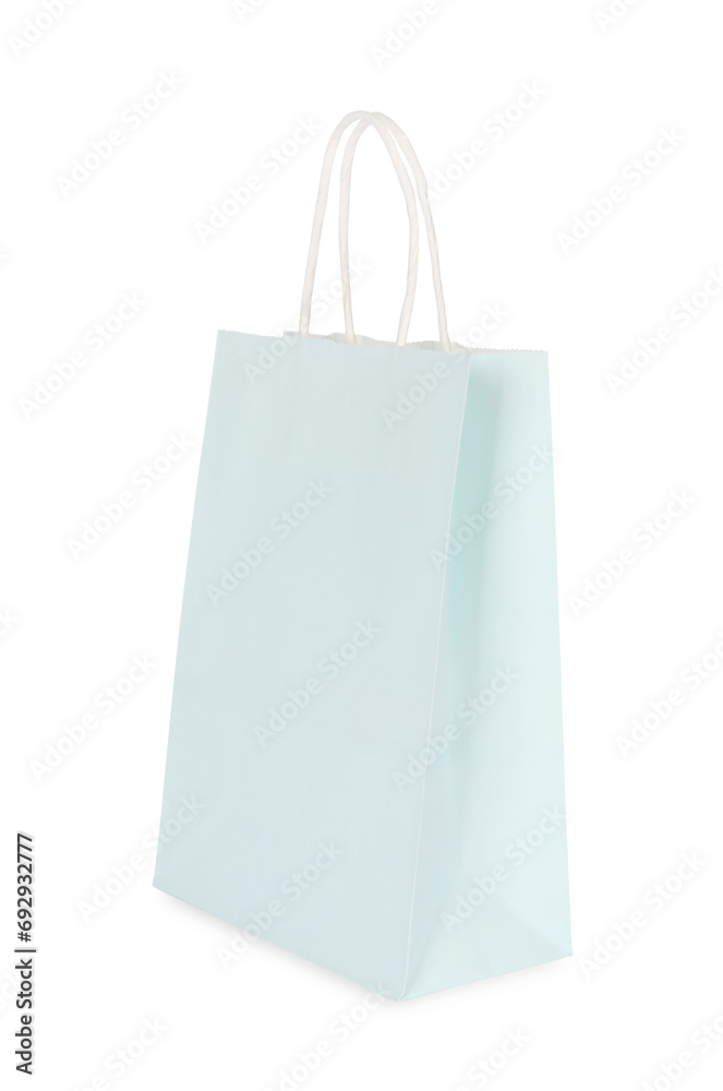 One light green paper shopping bag isolated on white