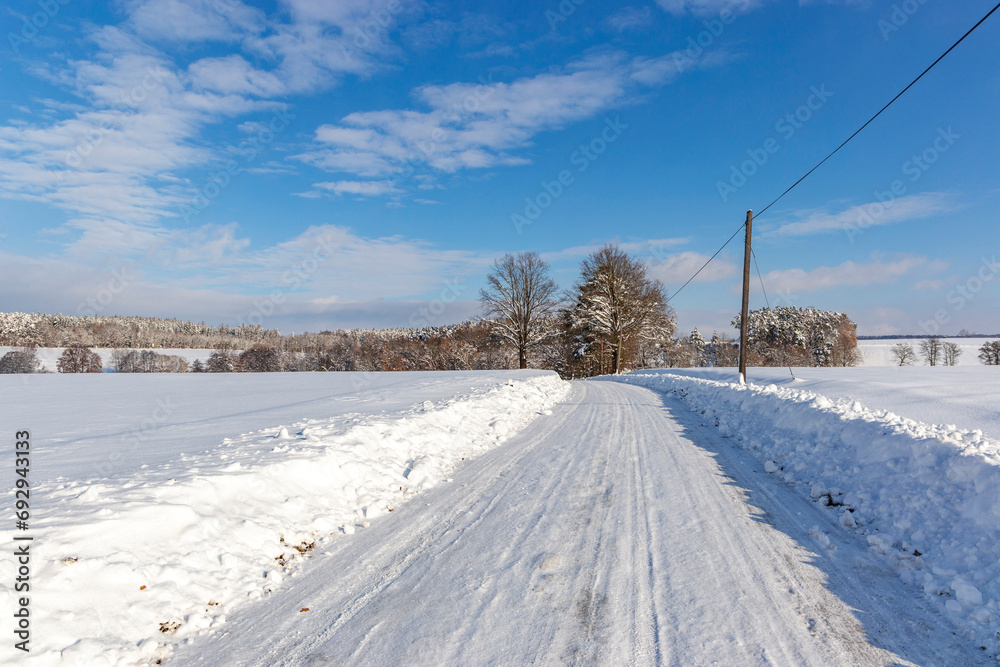 Road in the countryside after heavy snowfall in central Europe Road in the countryside after heavy snowfall in central Europe