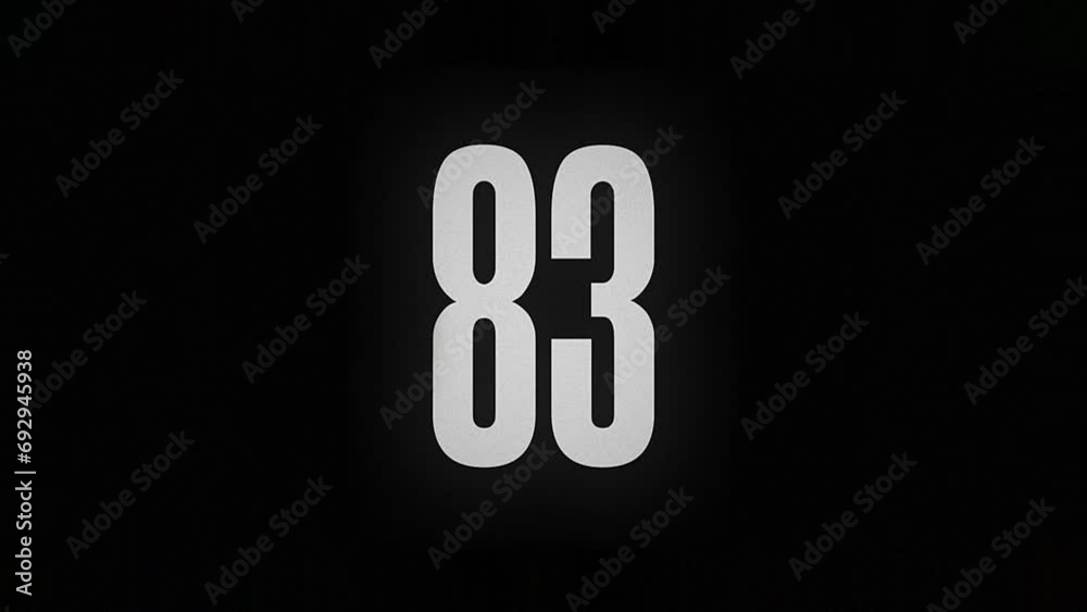 The number 83 smolders and burns on a black background, the number is on fire The number 83 smolders and burns on a black background, the number is on fire