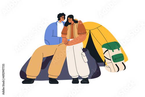 Campers, love couple. Happy hikers tourists relaxing near tent. Man and woman...