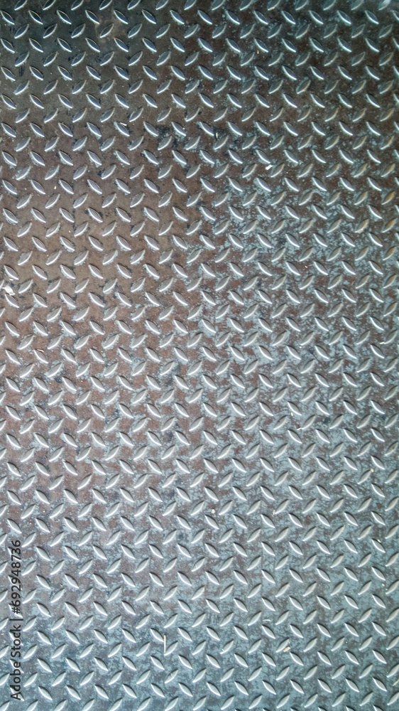 Fototapeta Abstract photograph with texture of stainless steel sheet, steel plate, non-slip used in industrial plants. Anti-slip stainless steel sheet Non-Slip Bottom Steel Plate
