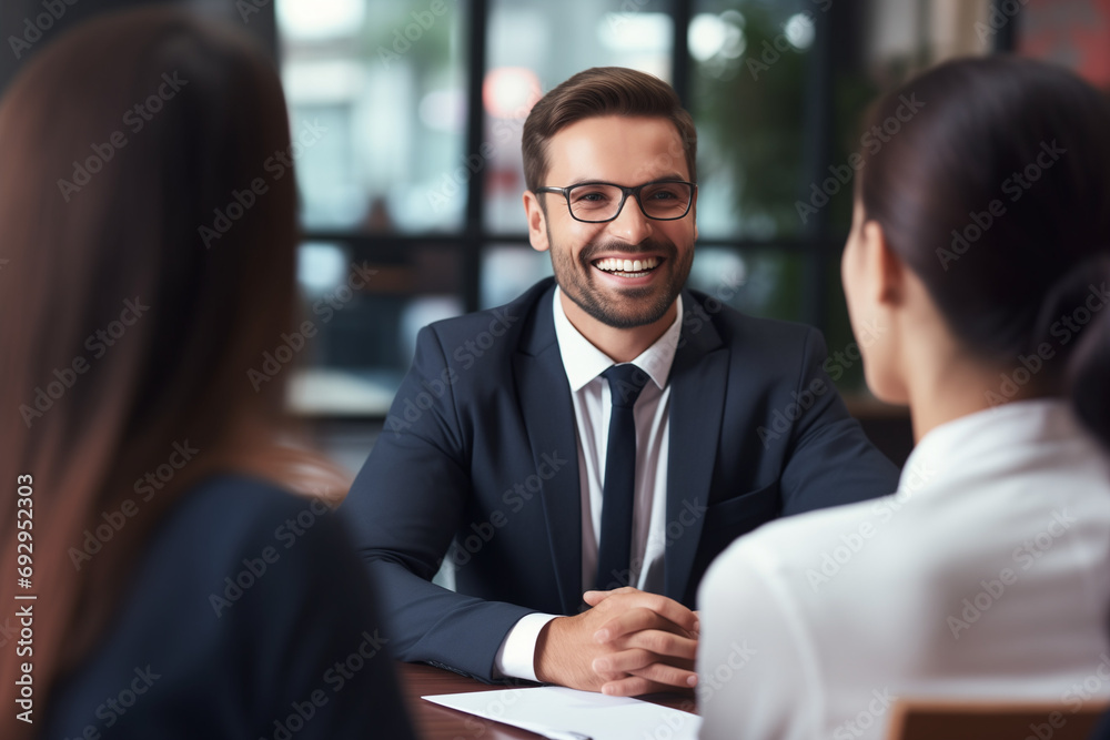 Successful Job Interview: Businessman and HR Managers in Engaging Recruitment Meeting Successful Job Interview: Businessman and HR Managers in Engaging Recruitment Meeting