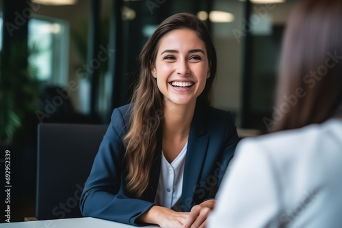 Businesswoman in Job Interview: Recruitment Meeting with Smiling HR Managers