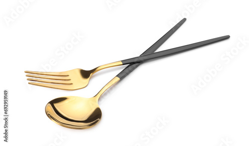 Shiny golden fork and spoon isolated on white. Luxury cutlery