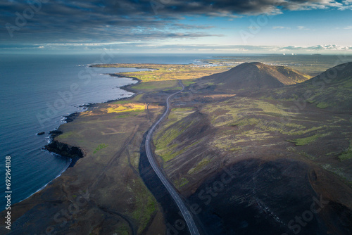 Golden Horizon: Aerial Panorama of Iceland's Coastal Majesty at Sunset (ID: 692964108)